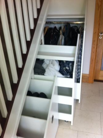 traditional stairs with under stair storage