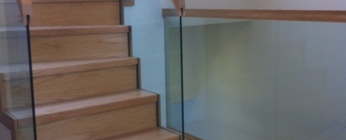 Oak Stairs with free standing glass balustrade