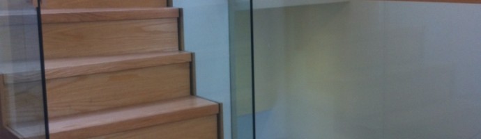 Oak Stairs with free standing glass balustrade