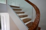Curved handrail freestanding glass balustrade