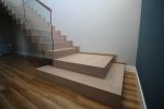 modern-cut-string-stairs-with-freestanding-glass-balustrade-11