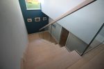 modern-cut-string-stairs-with-freestanding-glass-balustrade-13