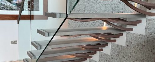 A CUSTOM BUILT CANTILEVERED STAIRCASE BY JEA FOR QUALITY AND BEAUTY