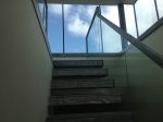 Modern oak stairs with glass
