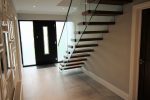 Modern stairs with glass riser