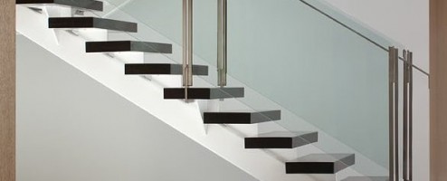 Mono String stairs in hardwood steel and glass