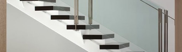 Mono String stairs in hardwood steel and glass