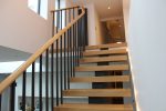 Mono String Modern Stairs with curved handrail