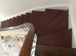 Traditional staircase in dark oak and white